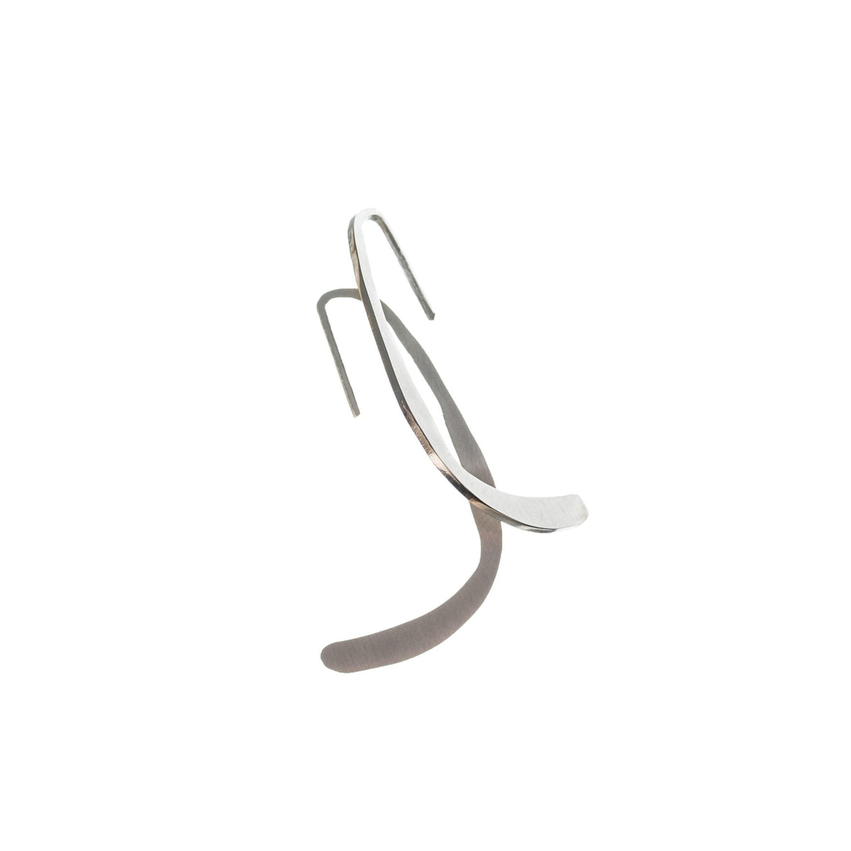 10. Angled view of Lentsius Curvi earrings, highlighting innovative design and sustainable materials