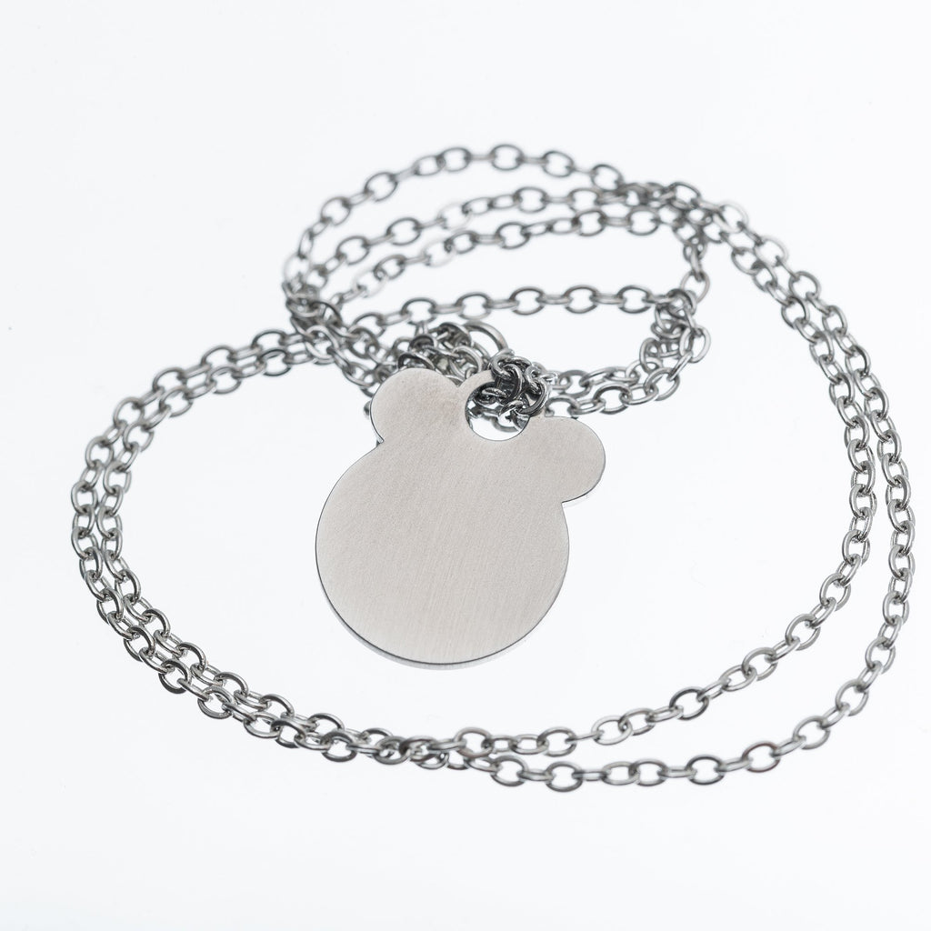 3. Studio shot of Ursa necklace by Lentsius with brushed stainless steel pendant