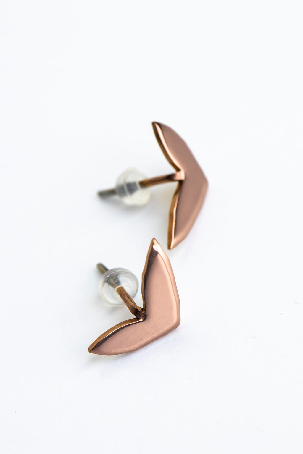 10. Studio shot of Lentsius Vola rose gold earrings, showcasing upcycled industrial material and design