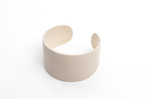 1. Lentsius Woody Bracelet in natural birch veneer, shown in studio setting