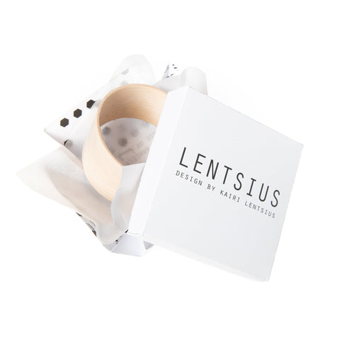 4. Lentsius Woody Bracelet in packaging, highlighting brand design
