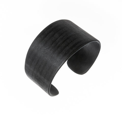 4. Studio shot of Lentsius Woody black pine bracelet, emphasizing upcycled material