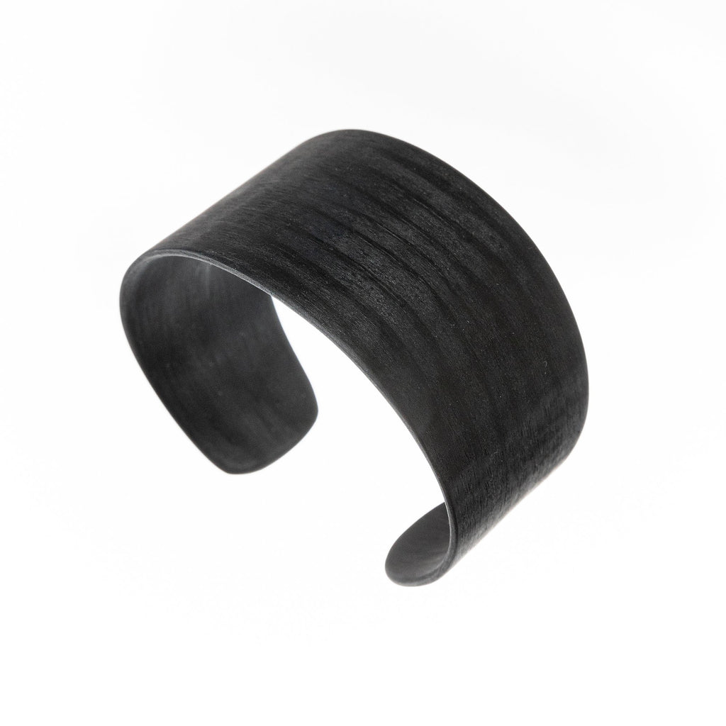 3. Studio image of Lentsius Woody black pine bracelet, showing handmade craftsmanship