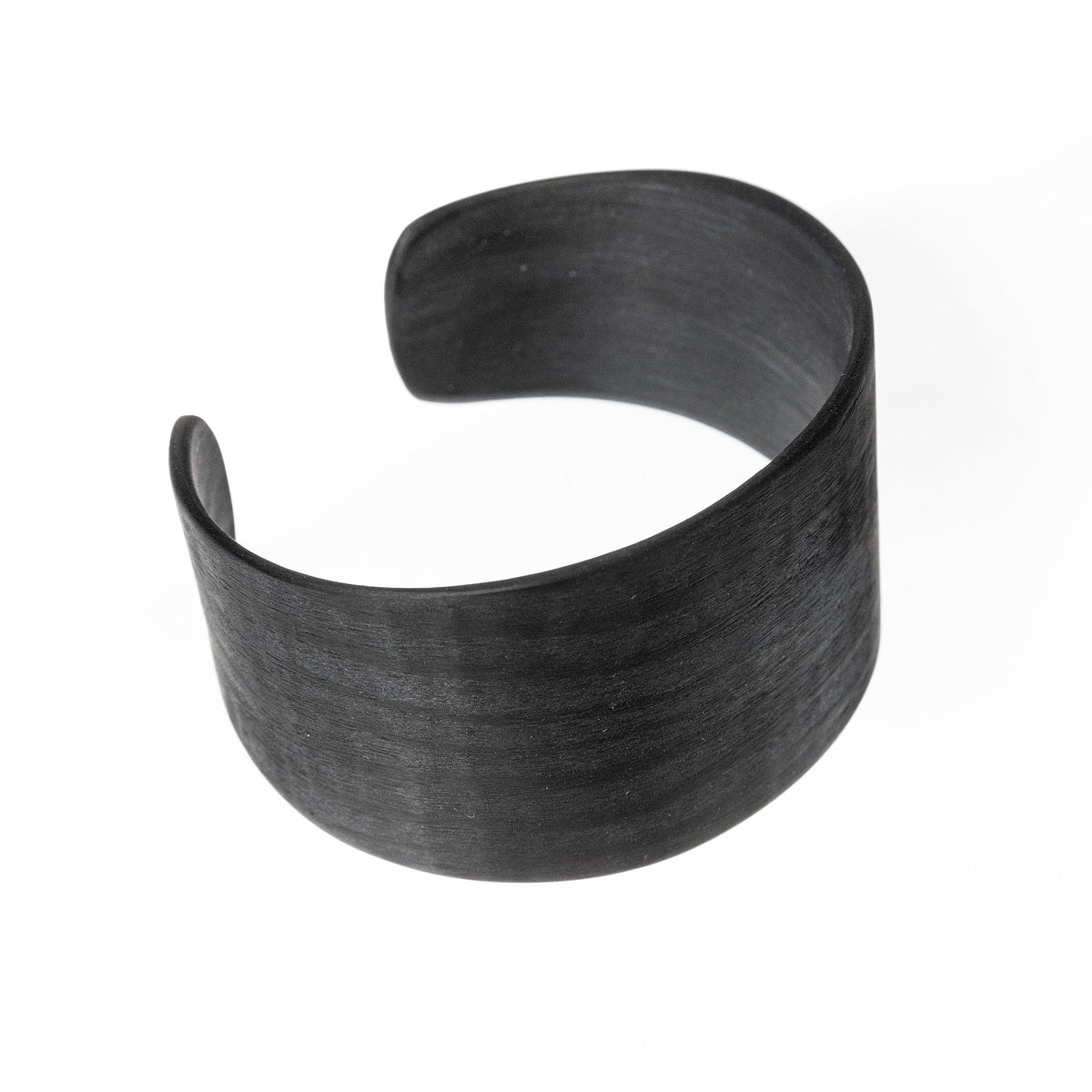 7. Studio image of Lentsius Woody black pine bracelet, featuring Scandinavian style