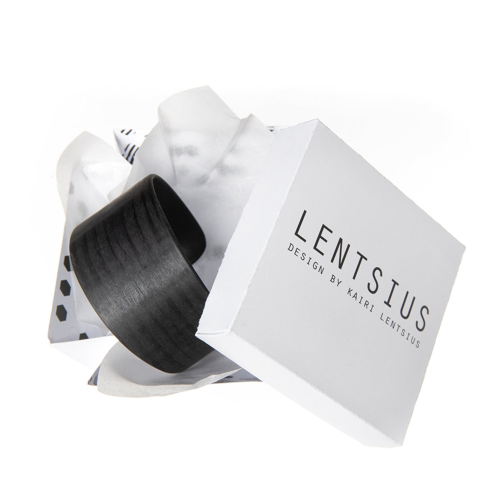 6. Lentsius Woody black pine bracelet in open packaging, showcasing sustainable design