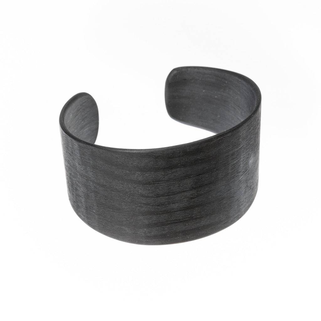 5. Close-up of Lentsius Woody black pine bracelet, highlighting toned veneer texture
