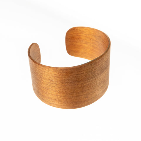 3. Close-up of Lentsius Woody Bracelet in Thermo Birch, emphasizing handmade craftsmanship and natural finish