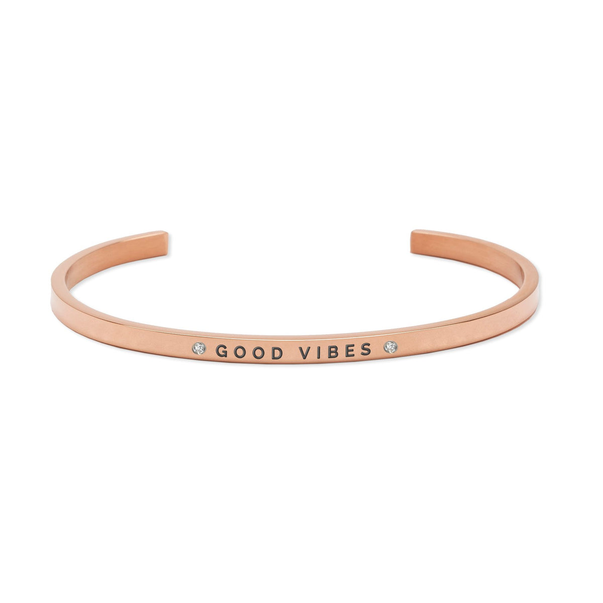 2. Rose gold 'Good Vibes' bracelet by Olla, featuring engraved text and crystal details, displayed in studio setting
