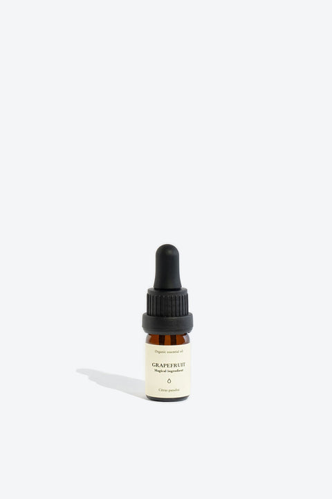1. Smells Like Spells Grapefruit Essential Oil in 5 ml glass bottle with pipette, studio shot