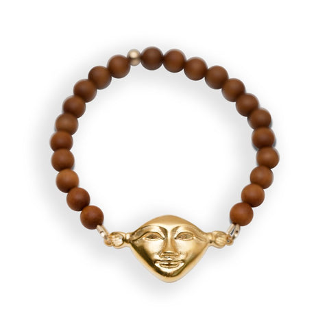 1. Hathor Harmony Bracelet in sandalwood with gold plated silver face, studio shot