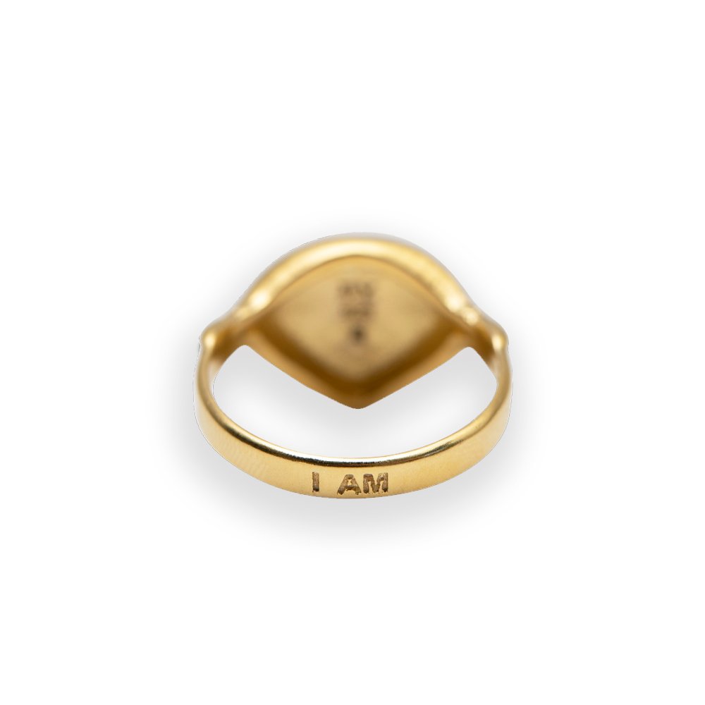 4. Close-up of Hathor Harmony Ring in gold by New Vintage by Kriss, showing 'I AM' engraving