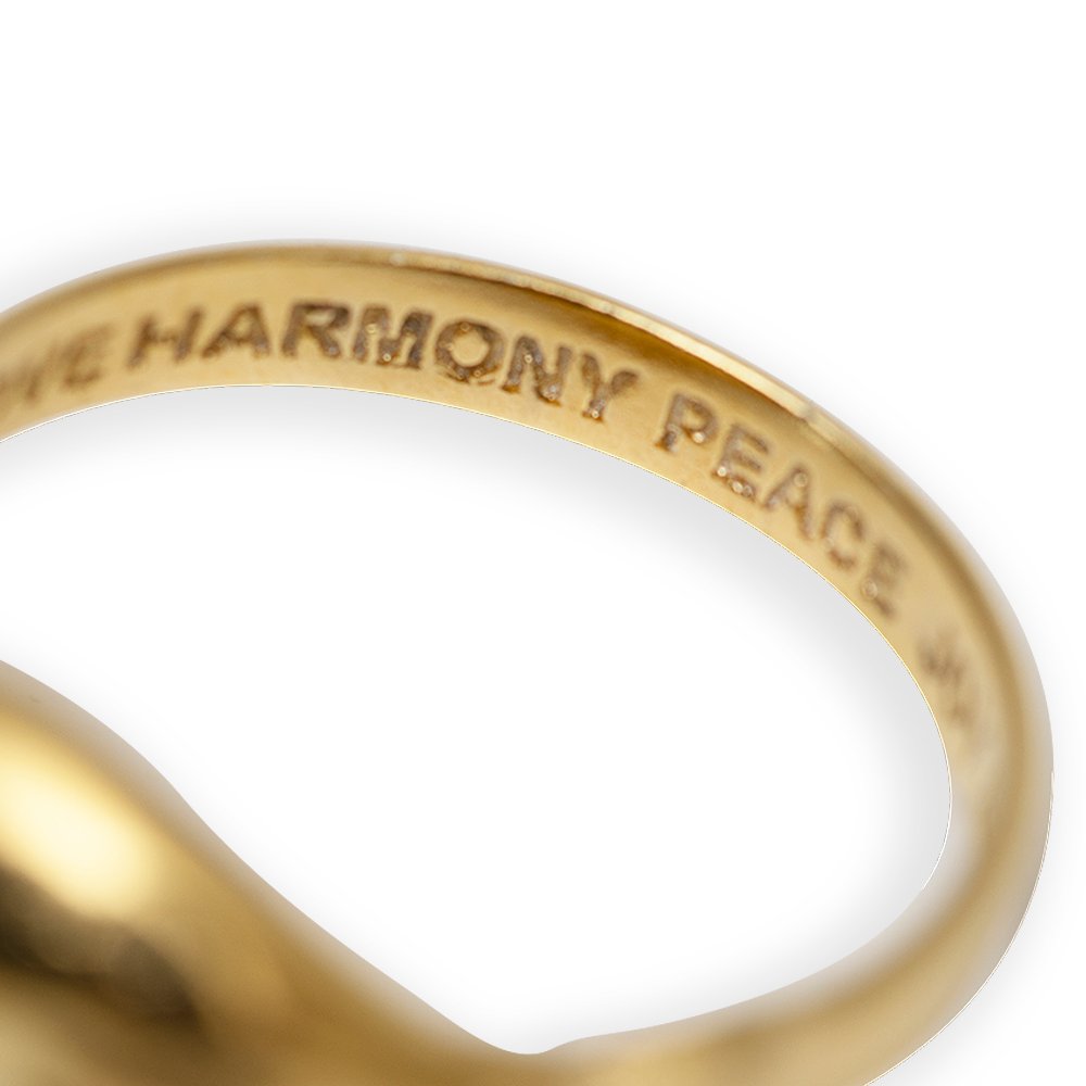 5. Detailed view of Hathor Harmony Ring in gold by New Vintage by Kriss, highlighting engraved text