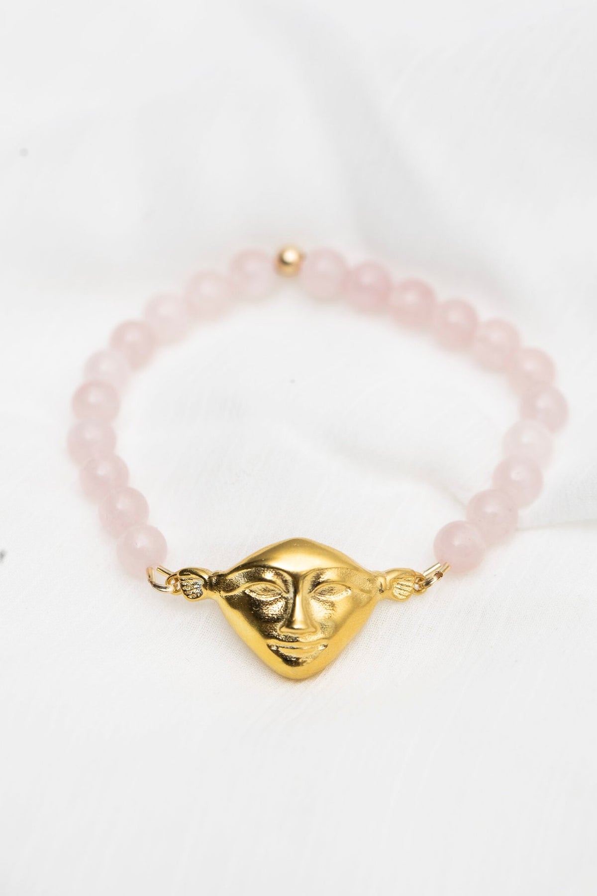 1. Hathor Harmony Bracelet with rose quartz beads and gold plated silver face, handmade by New Vintage by Kriss