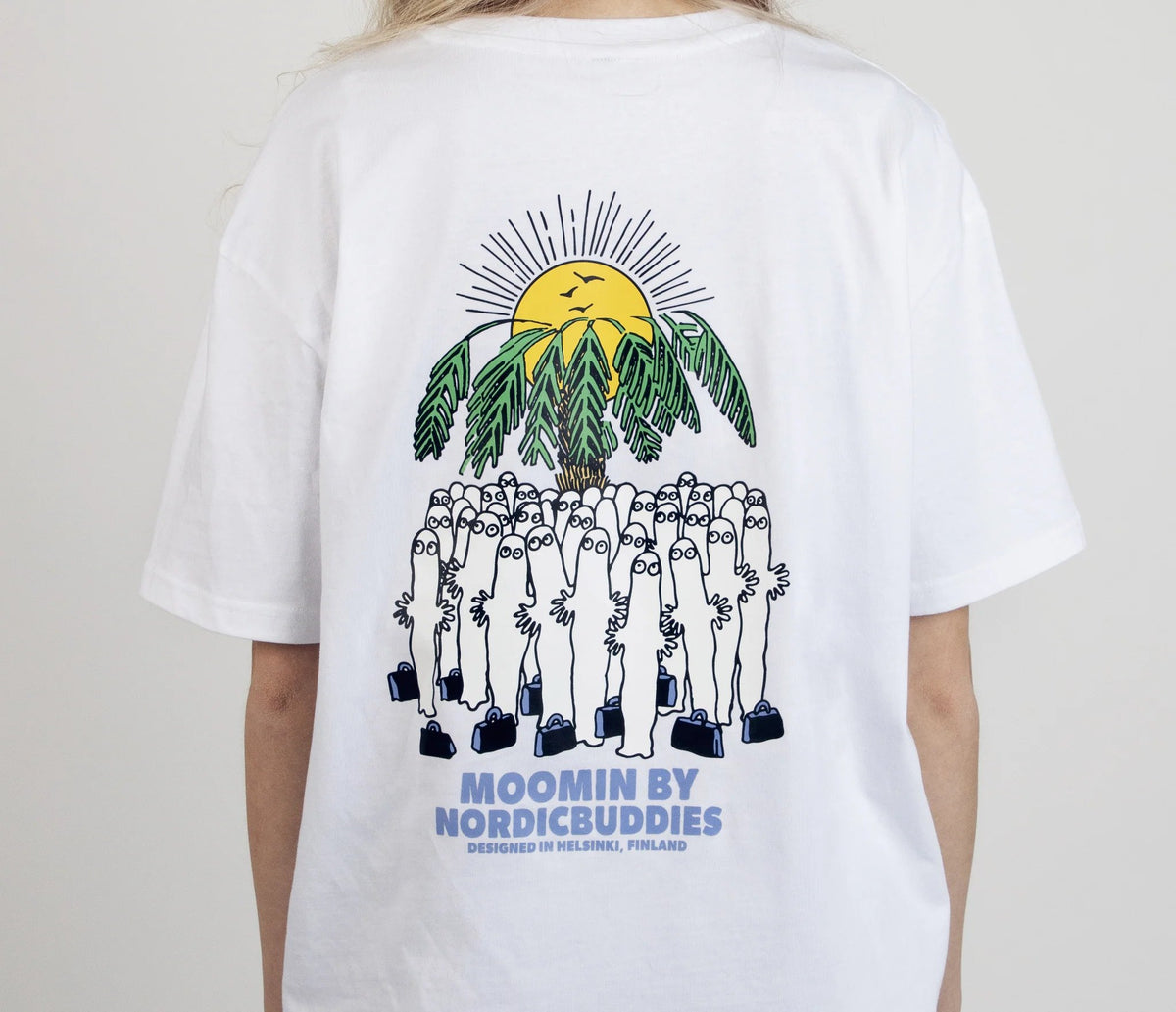 1. Women's Hattifatteners Surf Trip T-Shirt by Moomin, back view with graphic design, worn in studio