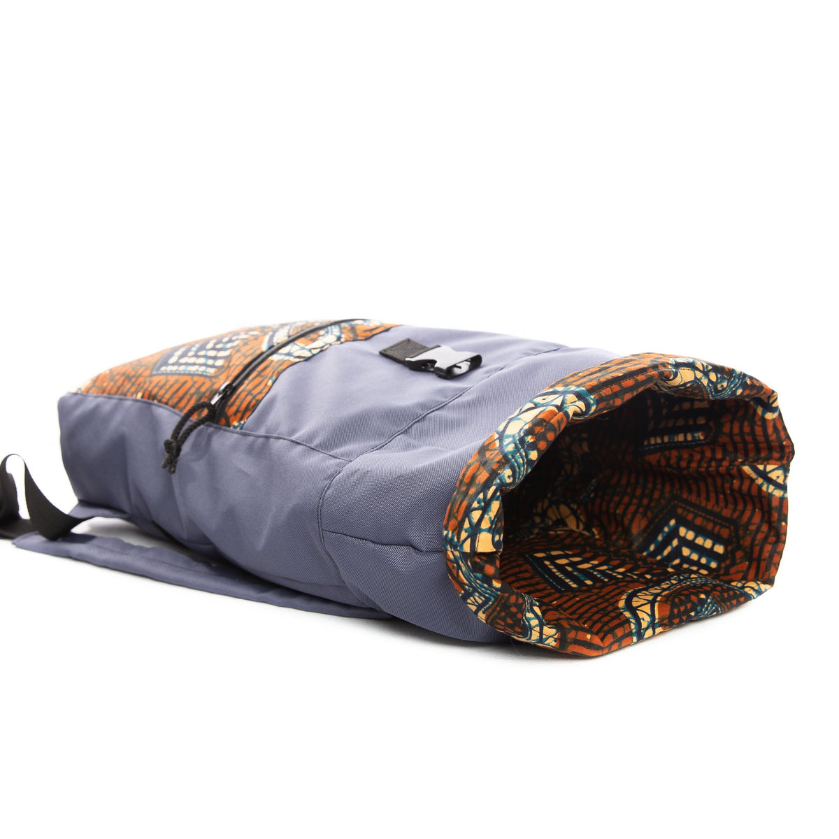 3. Side view of Drinbags HEART RIBBON waterproof backpack, highlighting roll-top and pattern