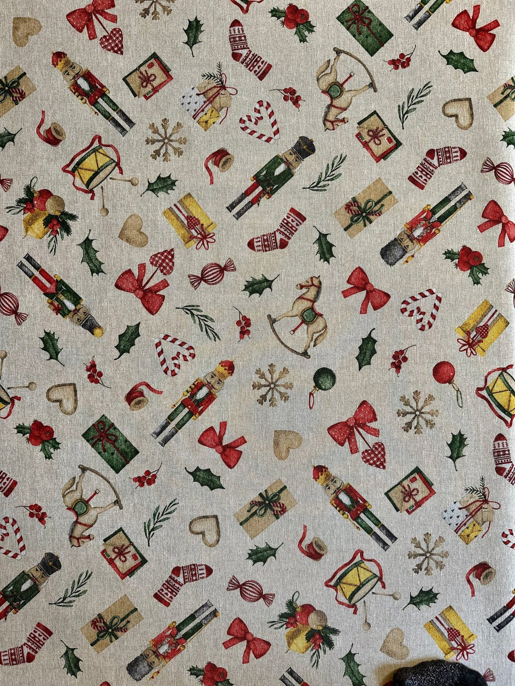 4. Flat lay of Festive Motive Christmas Story tablecloth featuring Christmas-themed print by Hortensias Home