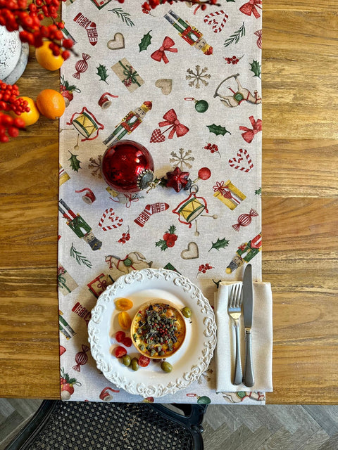 1. Christmas Story Table Runner by Hortensias Home on wooden dining table with festive decorations and a plate setting