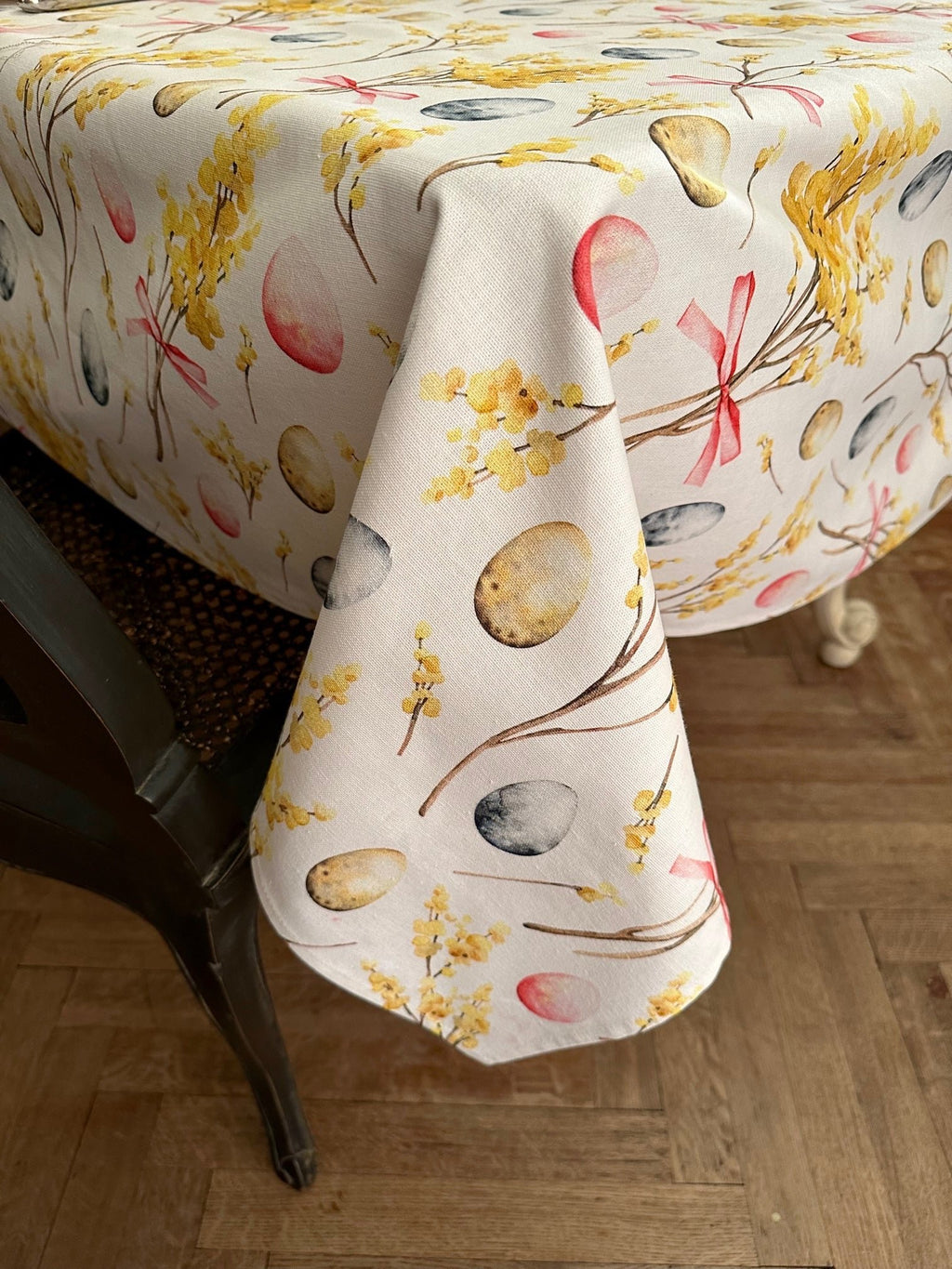 3. Side view of Hortensias Home Easter Happy tablecloth, highlighting festive print and cotton material