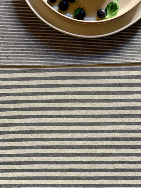 4. Close-up of blue striped pattern on Nord 1 table runner by Hortensias Home, with plate detail