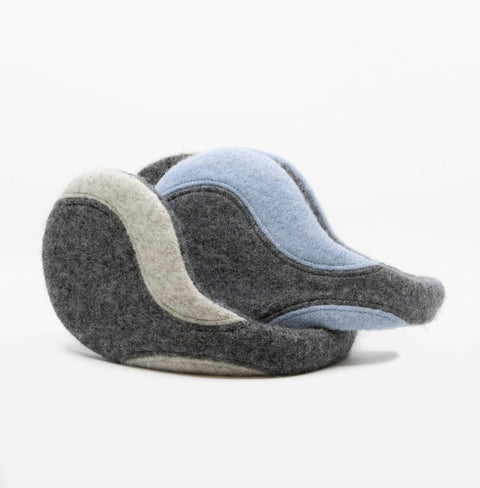 3. Close-up of HERTTA felted wool earmuffs in medium grey and light blue, shown in a folded position