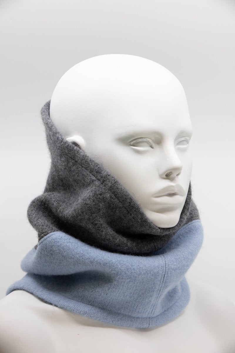 3. Unisex HERTTA felted wool tube scarf in medium grey and light blue, styled on mannequin in studio