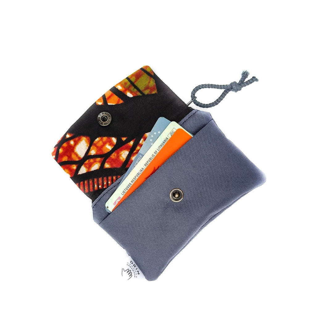 2. Open Drinbags PAINT wallet displaying card section with colorful interior pattern and cards inside
