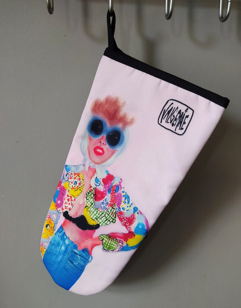 3. Close-up of Katrin Valgemäe oven glove with pop art design hanging on a hook