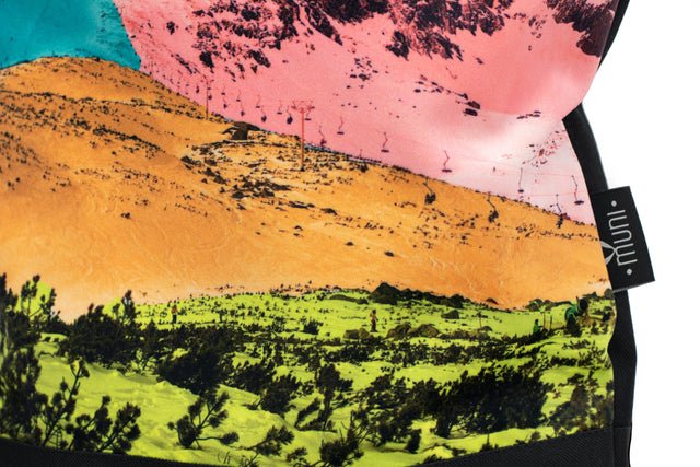 8. Detailed view of Muni Bold Mountains backpack fabric and Muni logo