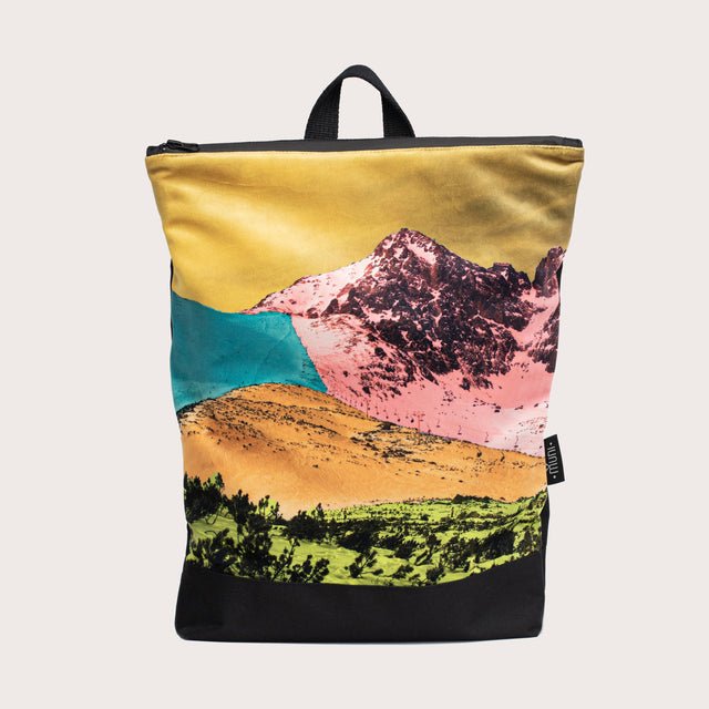 4. Studio shot of Muni Bold Mountains backpack with colorful mountain print