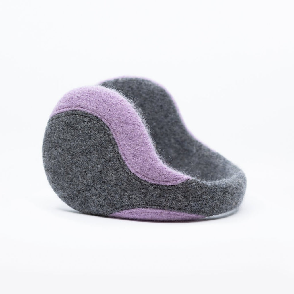 1. HERTTA felted wool earmuffs in medium grey and lilac, shown in a studio setting