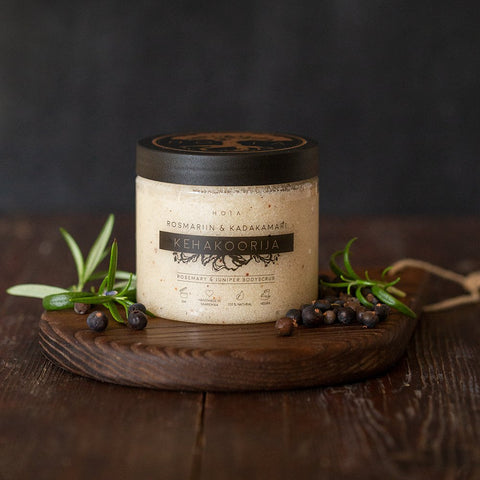 1. HOIA homespa Rosemary & Juniper Body Scrub, 200ml, displayed on wooden board with rosemary and juniper berries