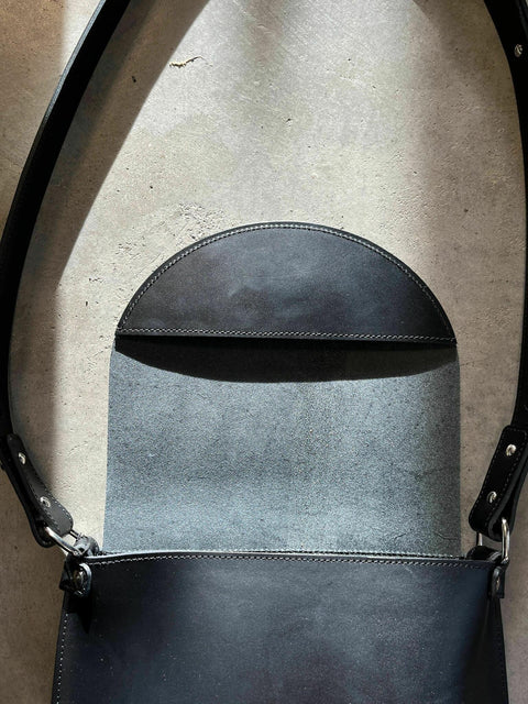 3. Open view of Stella Soomlais Undercover Lover handbag showing interior and flap design