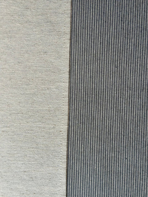 3. Detailed view of Hortensias Home Nord 2 tablecloth fabric, showing contrasting textures and blue striped pattern