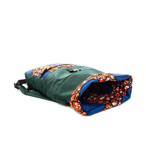 1. Drinbags COSMIC EYE waterproof backpack in green with vibrant red and blue pattern, front view with zippered pocket and roll-top closure