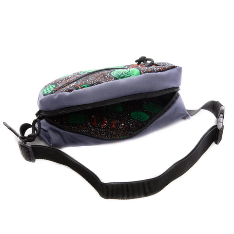 3. Side view of Drinbags BEANS waist bag highlighting adjustable strap and main compartment