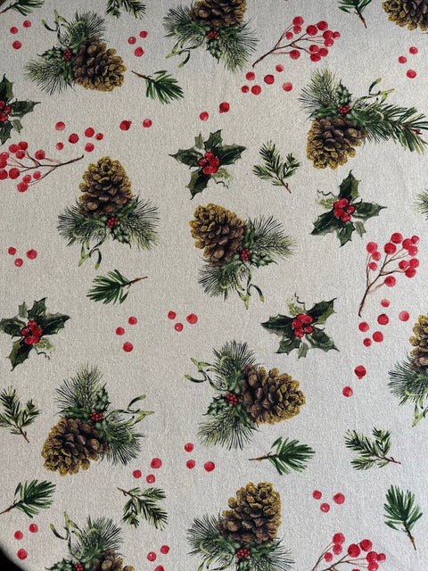 2. Close-up of Winter Motive Golden Pine tablecloth pattern with pinecones and red berries by Hortensias Home