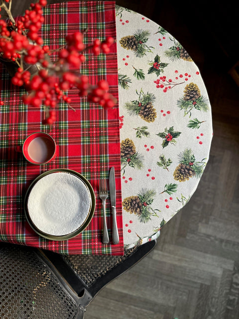 3. Christmas Motive Golden Pine Round Tablecloth by Hortensias Home, paired with red plaid runner, showcasing holiday decor