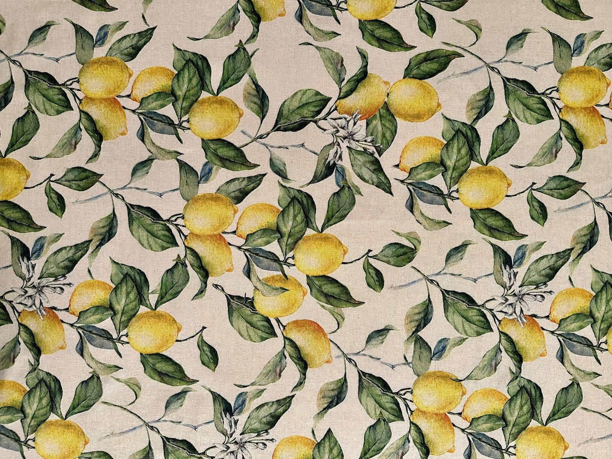 3. Close-up of Hortensias Home Lemon Linen tablecloth fabric with vibrant lemon and leaf pattern
