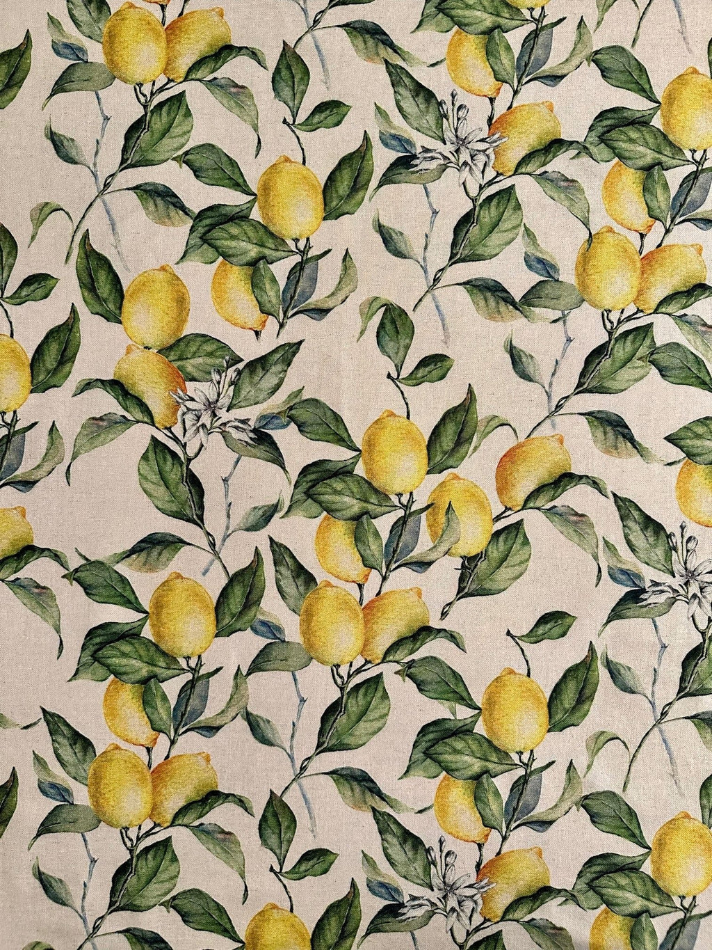 2. Close-up of Hortensias Home Lemon Linen Kitchen Towel fabric, highlighting detailed lemon and leaf pattern