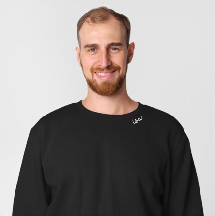 1. Unisex black Beebila sweatshirt with 'Isa' embroidery on collar, worn by male model in studio