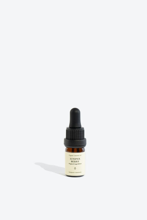 2. Smells Like Spells JUNIPER BERRY essential oil in 5 ml glass bottle with pipette, studio setting