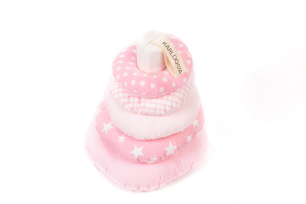 2. Pink Karloova stacking tower with rings showing polka dot and star patterns