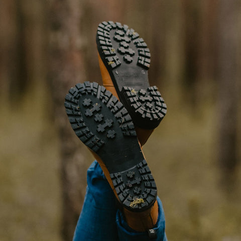 2. Close-up of KIRA 3.0 Chelsea Boots' soles, highlighting durable tread pattern