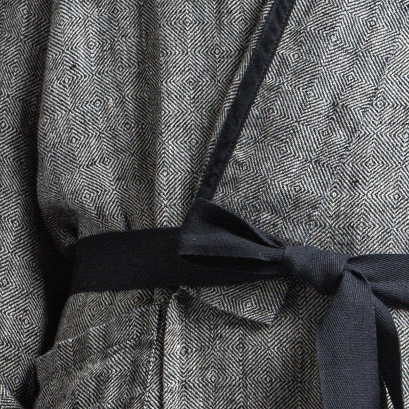 3. Close-up of black belt tied on black fishbone pattern linen bathrobe