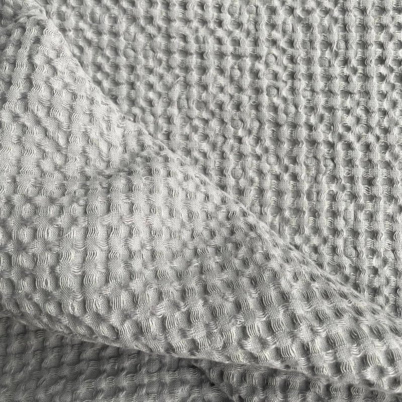 4. Close-up of gray waffle fabric texture highlighting linen and cotton blend