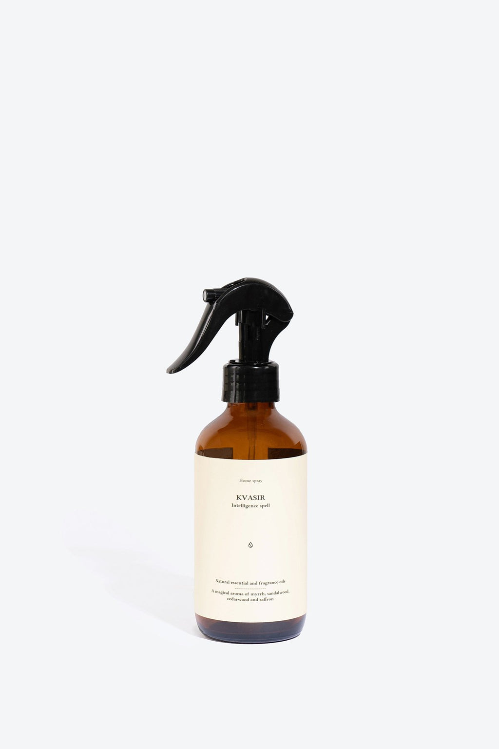 1. Smells Like Spells Perfumed Home Spray KVASIR in amber bottle, studio setting