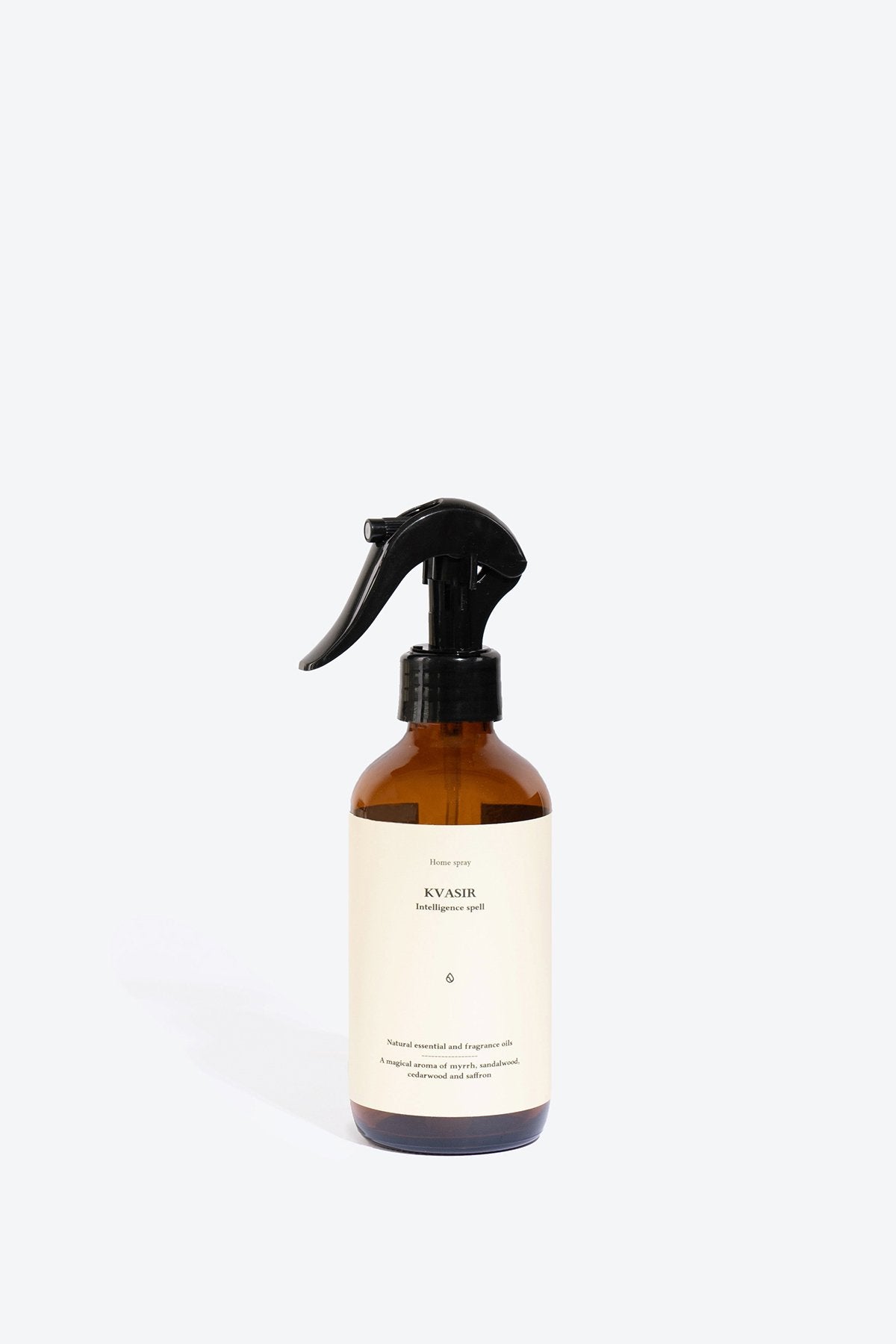 1. Smells Like Spells Perfumed Home Spray KVASIR in amber bottle, studio setting