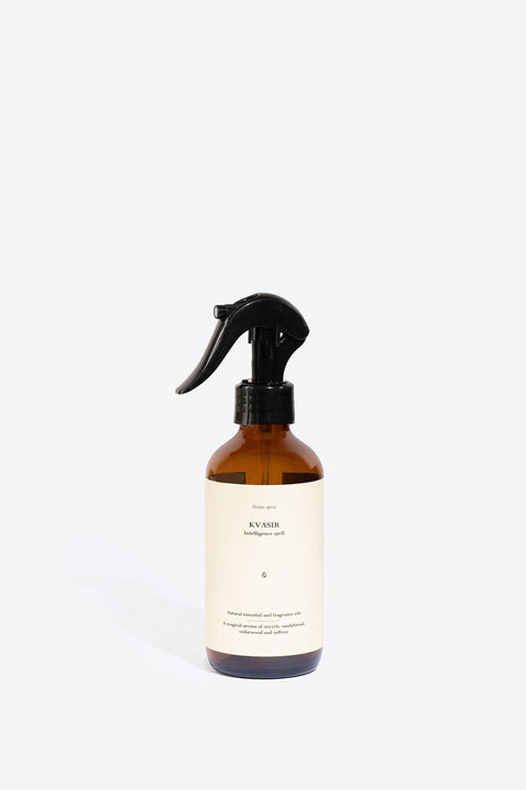 1. Smells Like Spells Perfumed Home Spray KVASIR in amber bottle, studio setting