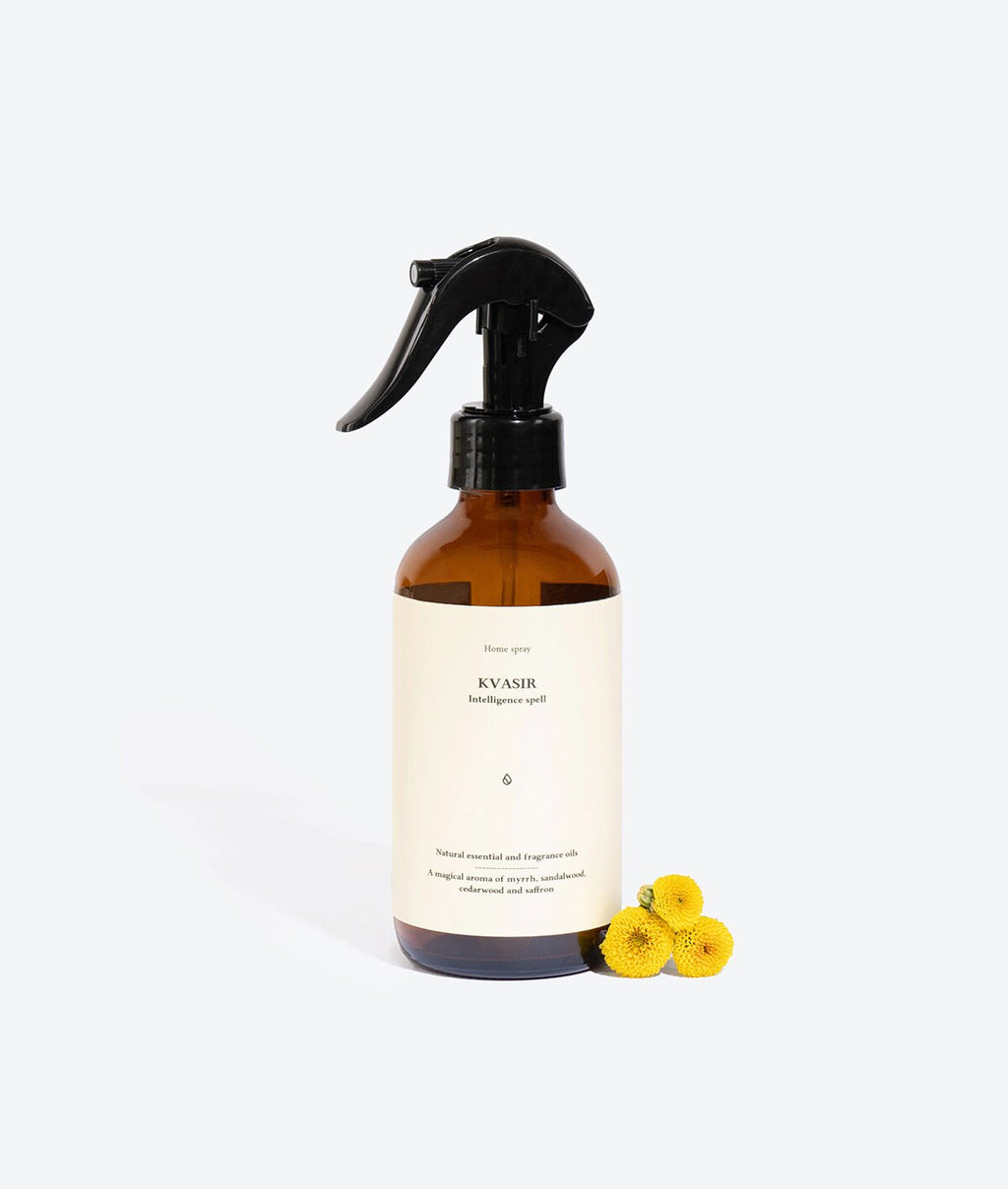 2. Smells Like Spells Perfumed Home Spray KVASIR with yellow flowers, studio setting