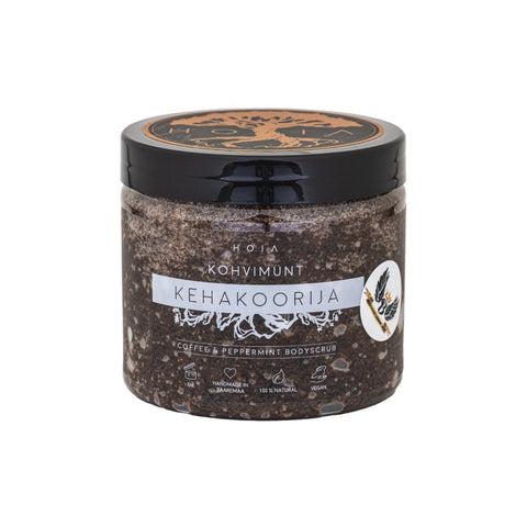 2. HOIA homespa coffee and peppermint body scrub jar in studio setting